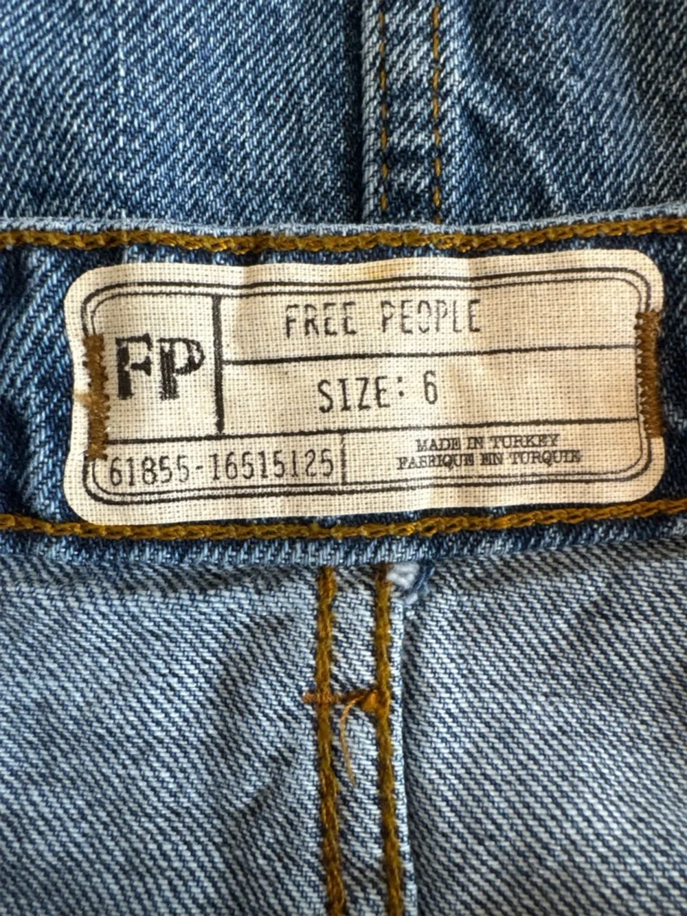 FREE PEOPLE Midi Blue Denim Skirt with Side Slits.
